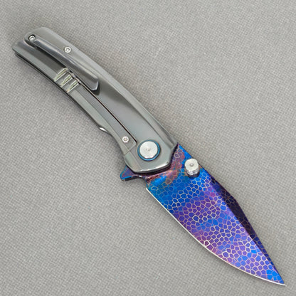 VORIXN Dragonflare KB083 blade and hand-flamed zirconium handle detail