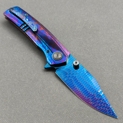 Vorixn "Celestial Current" Flipper & Thumb Stud Knife Hand-Flamed Zirconium Handle (3.8" Damascus Blade) KB099