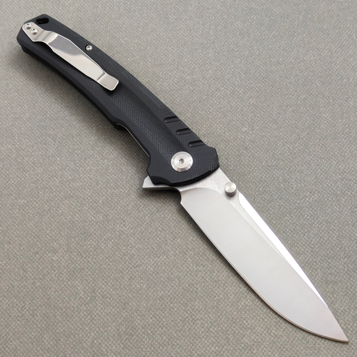VORIXN KA001 Folding Knife – open clip side view showing pocket clip and Stainless Steel & G10 handle