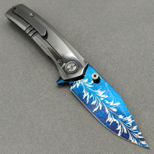 VORIXN Azure Feather zirconium Damascus folding knife open, pocket clip side, blade angled 45° upward – KB097