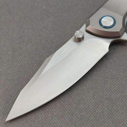 VORIXN KB014 non-clip side blade detail showing the 10Cr15CoMoV brushed finish blade.