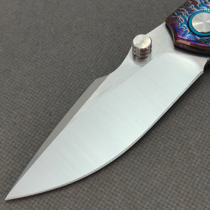 VORIXN KB051 non-clip side blade detail showing the 10Cr15CoMoV blade.