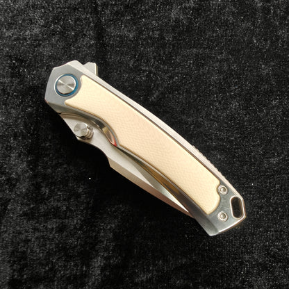 VORIXN LUCENT folding knife closed, handle design visible, full knife non-clip side