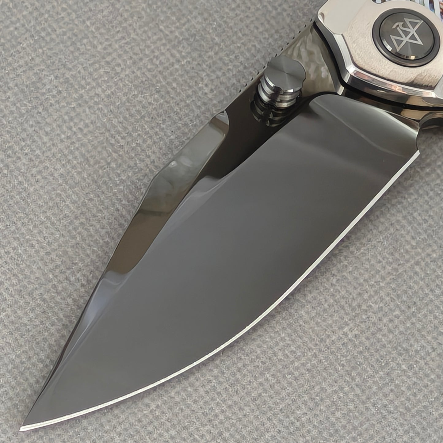 VORIXN KB103 Ocean Mirage Folding Knife – blade detail showing M390 steel and edge