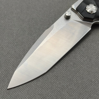 VORIXN KA009 non-clip side blade detail showing the 9Cr13 blade.