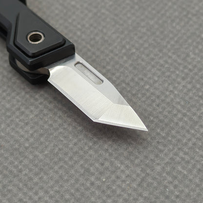 VORIXN NA001 Super Tiny Folding Knife – closed non-clip side view showing Aluminum Alloy handle