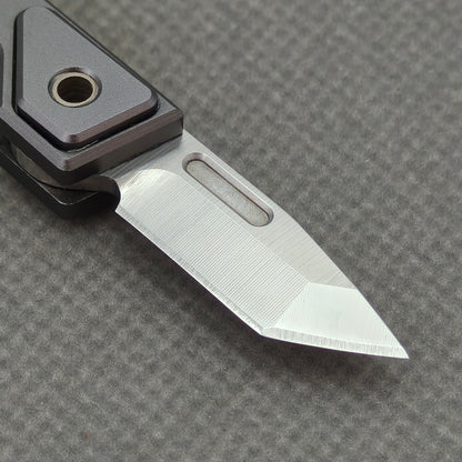 VORIXN NA005 Super Tiny Folding Knife – closed non-clip side view showing Aluminum Alloy handle