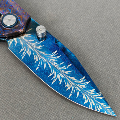 VORIXN KB081 Aurora Bright Folding Knife – clip side blade detail showing Damascus steel and handle junction