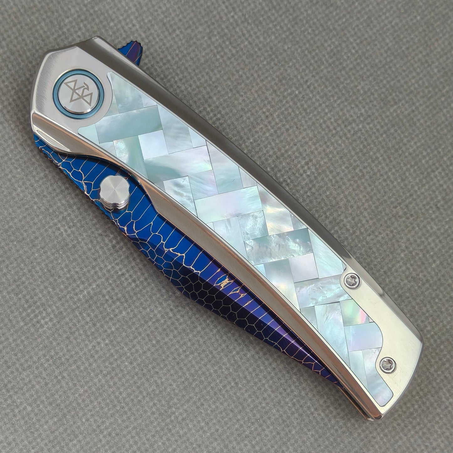 VORIXN Ocean Mirage KB100 hand-flamed blade surface detail