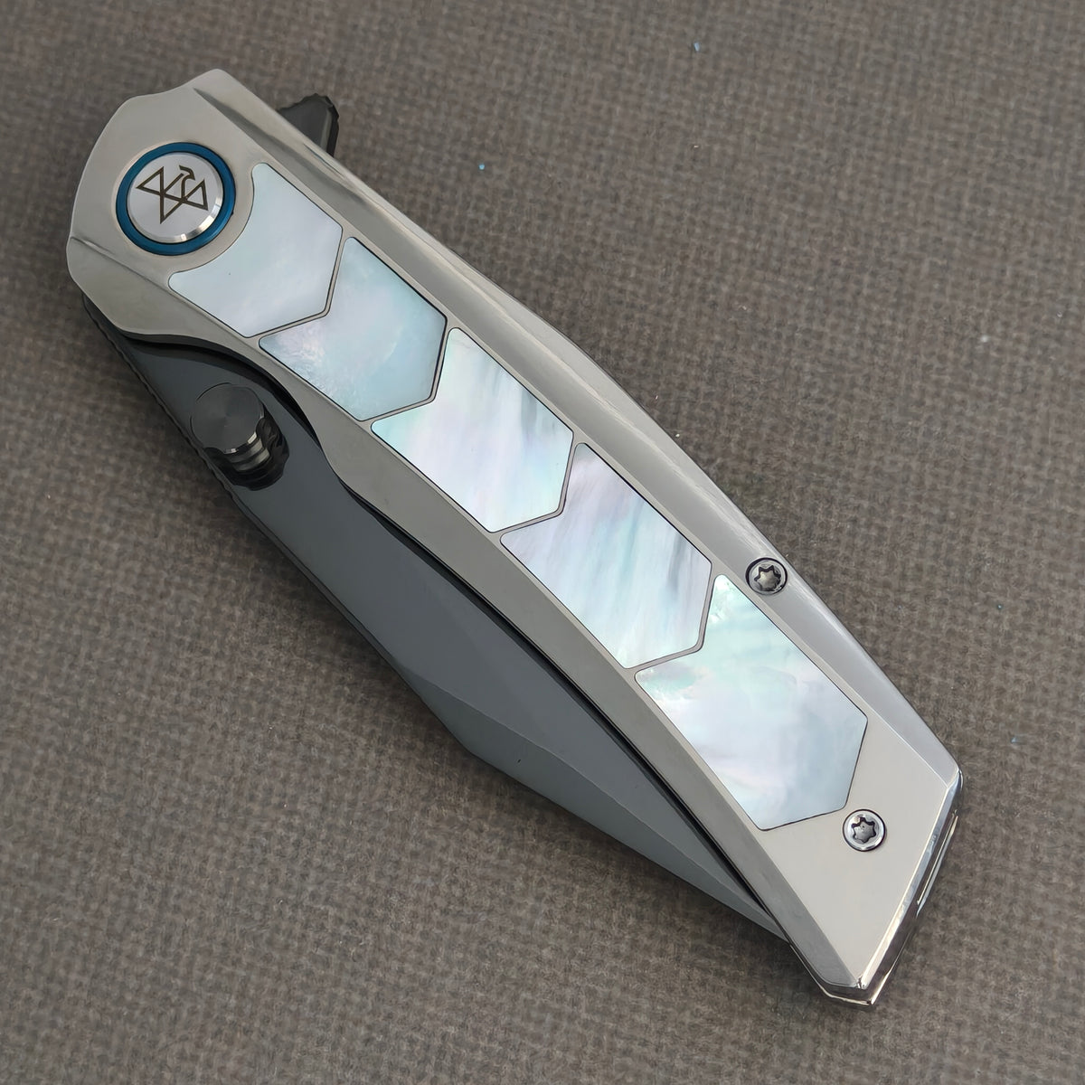 VORIXN Pearlcrest KB158 Folding Knife – closed non-clip side view showing geometric mother-of-pearl inlays and branded pivot.