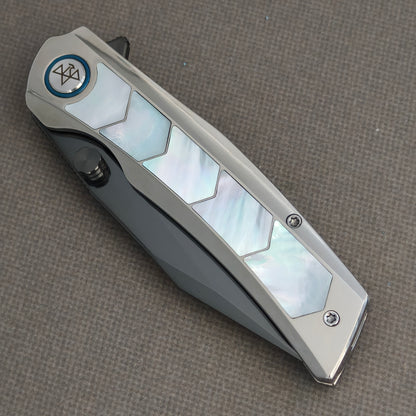 VORIXN Pearlcrest KB158 Folding Knife – closed non-clip side view showing geometric mother-of-pearl inlays and branded pivot.