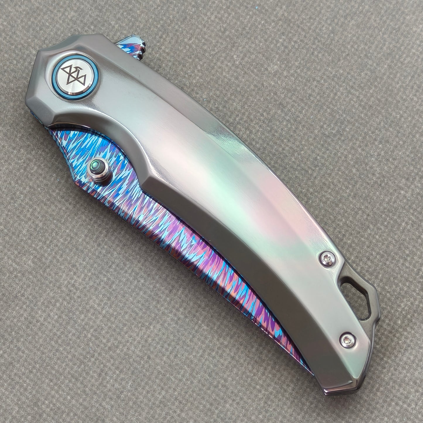 VORIXN PrismWake KB137 Folding Knife – closed non-clip side view showing Zirconium handle design and pivot.