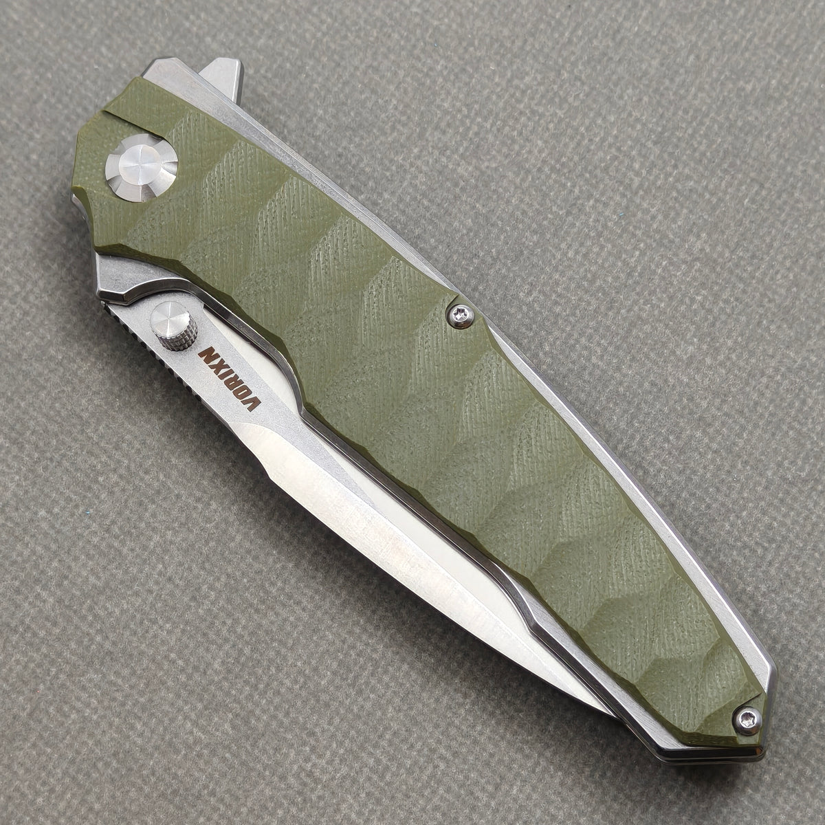 VORIXN KA007 Folding Knife – closed non-clip side view showing Stainless Steel & G10 handle design and pivot
