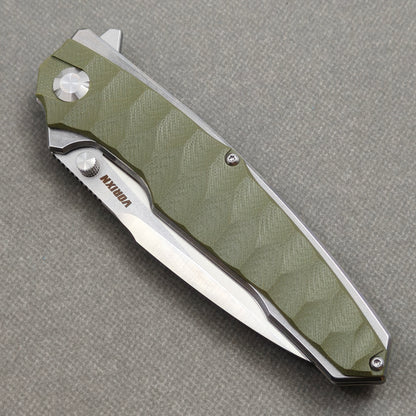 VORIXN KA007 Folding Knife – closed non-clip side view showing Stainless Steel & G10 handle design and pivot