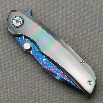 VORIXN Spectra KB127 Folding Knife – closed non-clip side view showing zirconium handle design and pivot