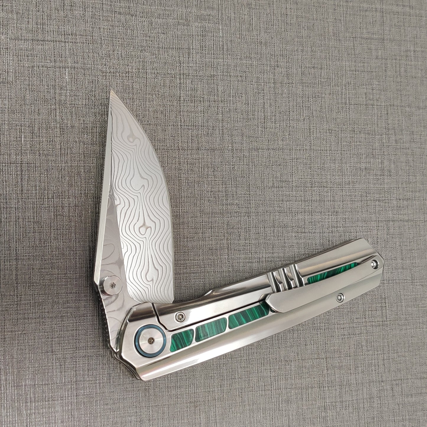 VORIXN "Forest Mirage" Flipper & Thumb Stud Knife Malachite Inlaid Titanium Handle (3.6" Damascus Blade) KB056