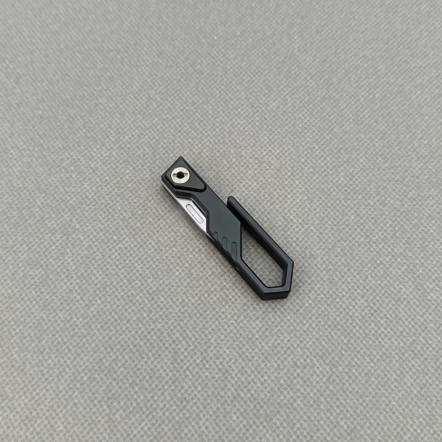 VORIXN NA001 Super Tiny Folding Knife – closed clip side view showing handle and pocket clip