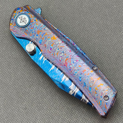 Vorixn "Aurora Bright" Flipper & Thumb Stud Knife Hand-Flamed Zirconium Handle (3.8" Feather Damascus Blade) KB110