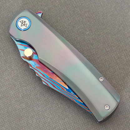 VORIXN Steelwraith KB143 Folding Knife – closed non-clip side view showing Zirconium handle design and pivot.