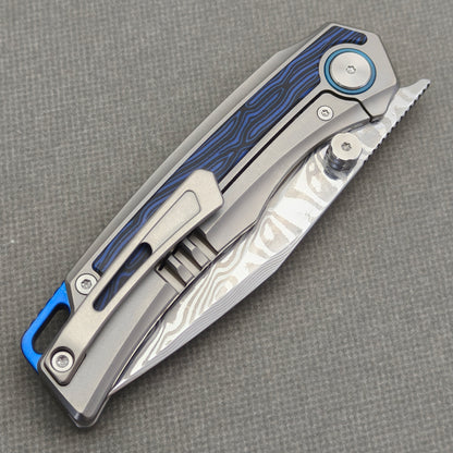 VORIXN Tidecipher KB157 Folding Knife – closed clip side view showing pocket clip, frame lock, and blue handle inlay.