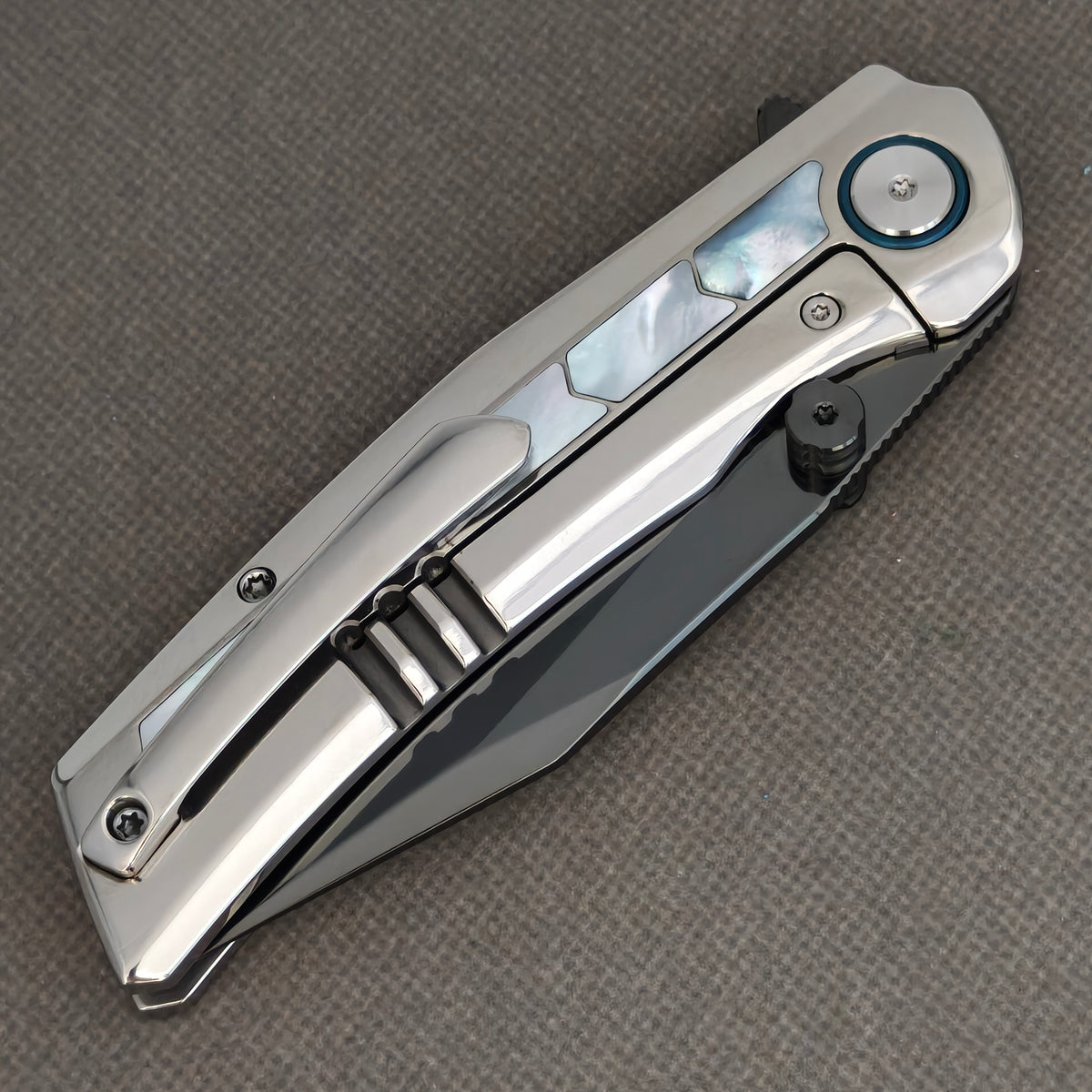 VORIXN Pearlcrest KB158 Folding Knife – closed clip side view showing pocket clip, frame lock, and mother-of-pearl inlays.