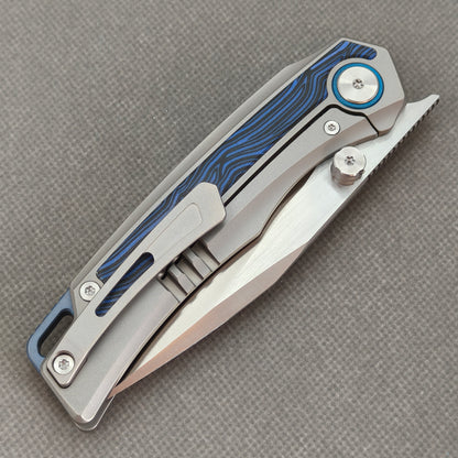 VORIXN KB005 closed clip-side view with pocket clip, screws, and G10 handle back.