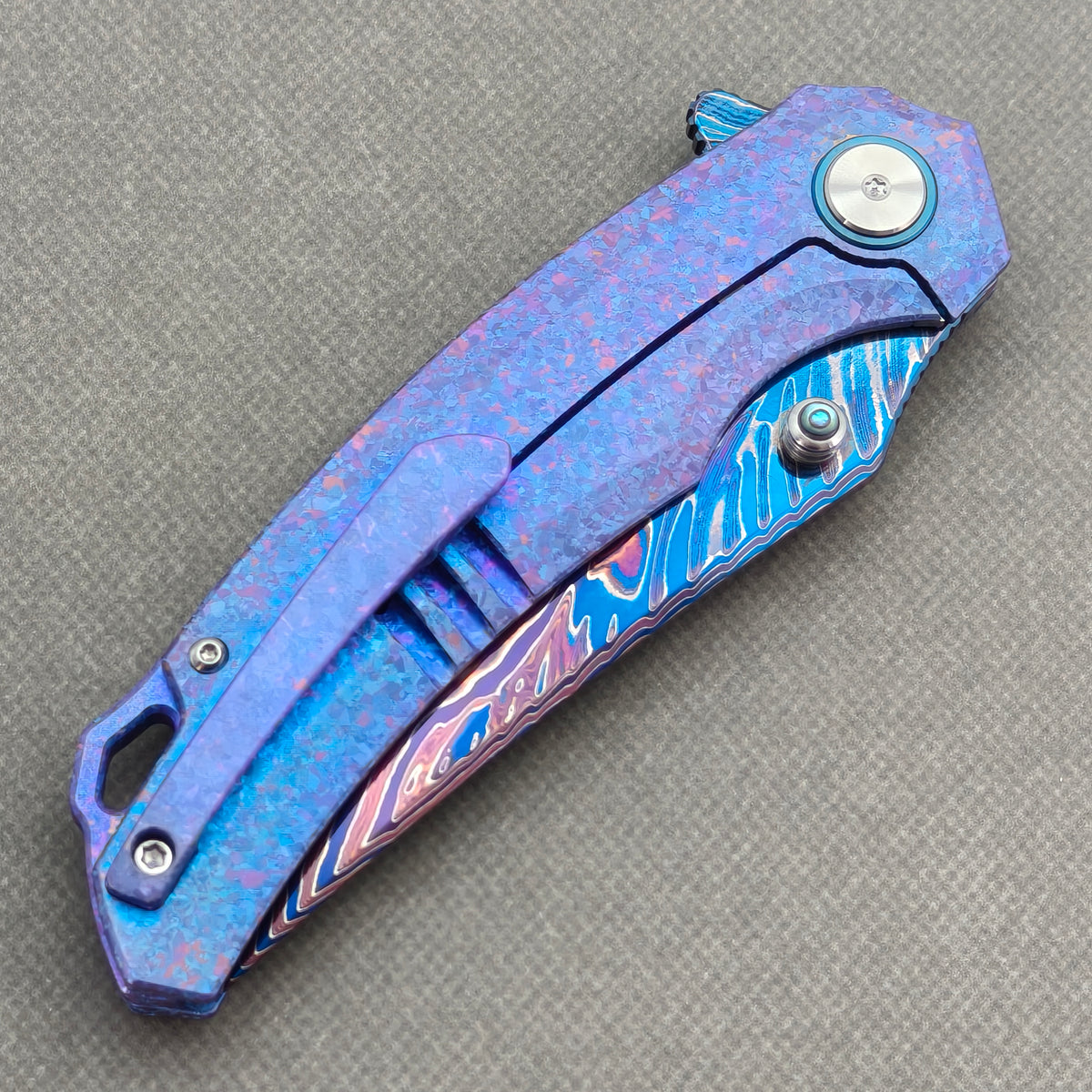 VORIXN Rimeflare KB132 Folding Knife – closed clip side view with pocket clip and Crystallized Titanium handle back.