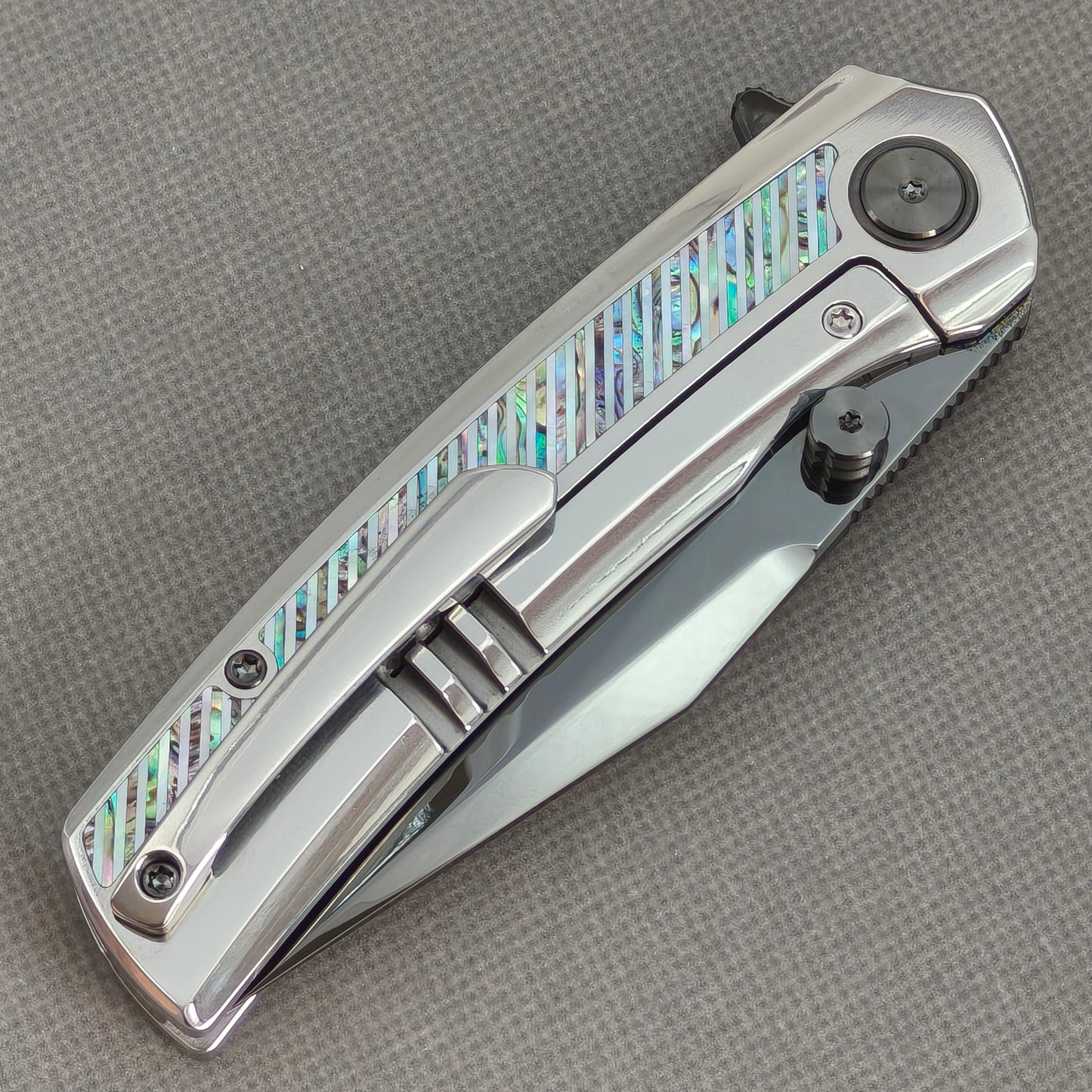 VORIXN KB103 Ocean Mirage Folding Knife – closed clip side view with pocket clip and Titanium handle back