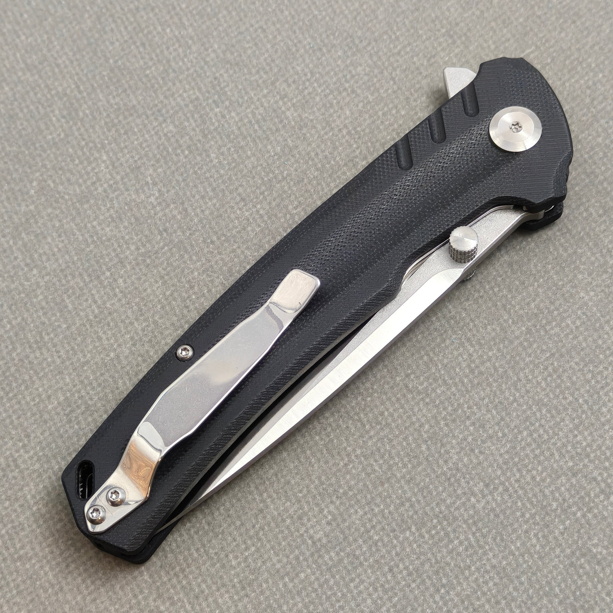 VORIXN KA001 Folding Knife – closed clip side view with pocket clip and G10 handle back