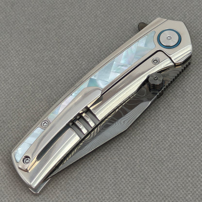 VORIXN KB104 Ocean Mirage Folding Knife – closed clip side view with pocket clip and Titanium handle back