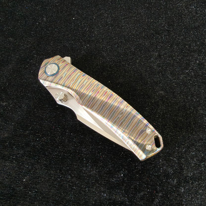 VORIXN Verdant folding knife closed non-clip side showing lab-created turquoise inlay pattern