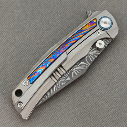 Vorixn „Nebula“ Flipper- und Daumenpin-Messer mit Griff aus Titanflammen-Zirkuinlay (3,8" Klinge aus Damaststahl) KB018 