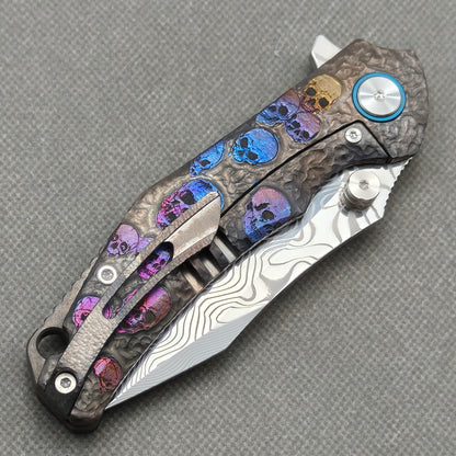 VORIXN KB096 closed clip-side view with pocket clip, screws, and engraved titanium handle back.