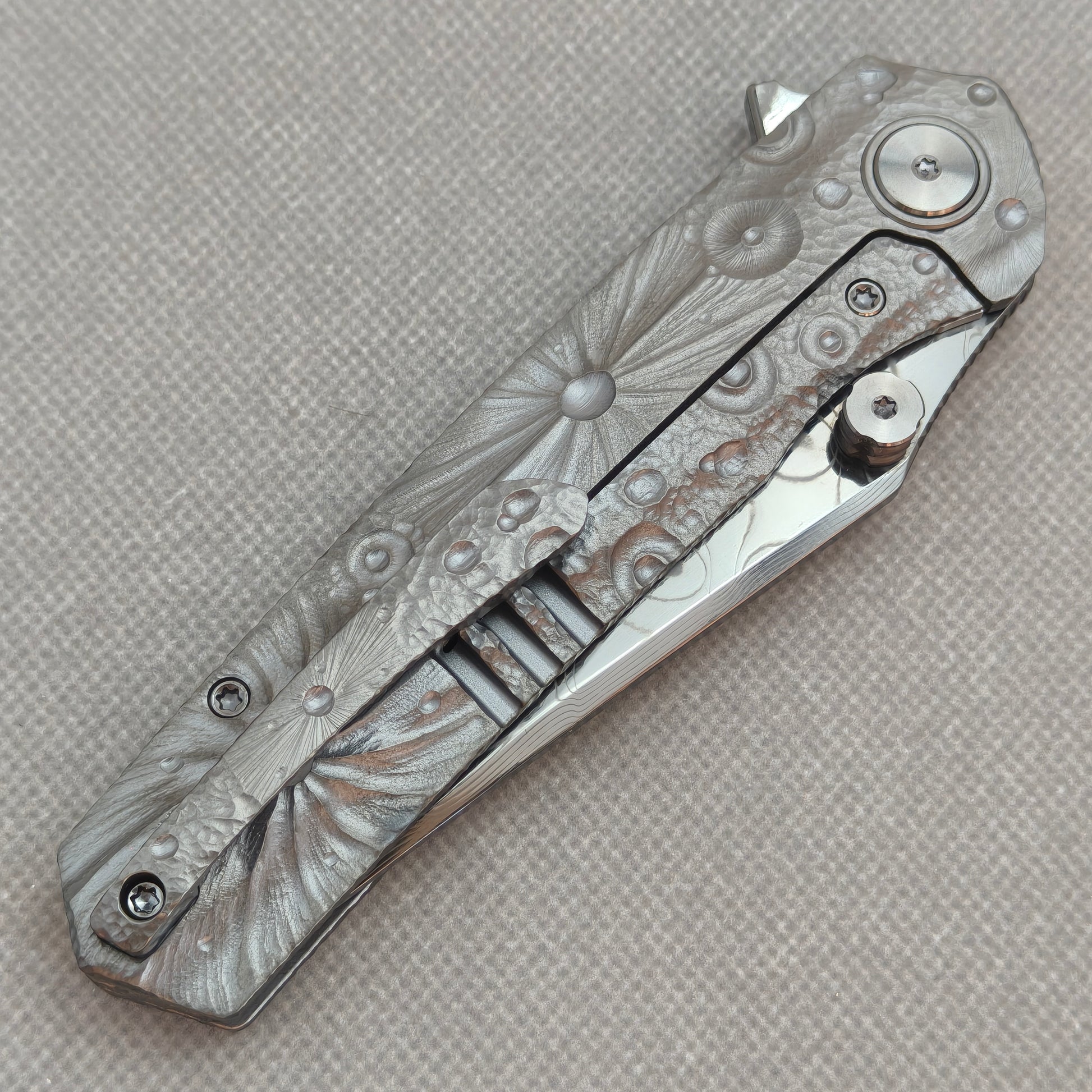 VORIXN KB098 Impact Origin Folding Knife – closed clip side view with pocket clip and Titanium handle back