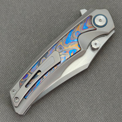 VORIXN KB030 Abyssal Folding Knife – closed clip side view with pocket clip and Titanium handle back
