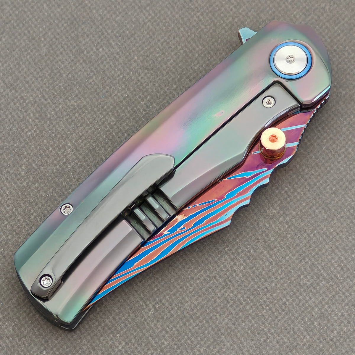 VORIXN Steelwraith KB143 Folding Knife – closed clip side view with pocket clip and Zirconium handle back.