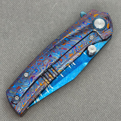 VORIXN KB081 Aurora Bright Folding Knife – closed clip side view with pocket clip and Zirconium handle back