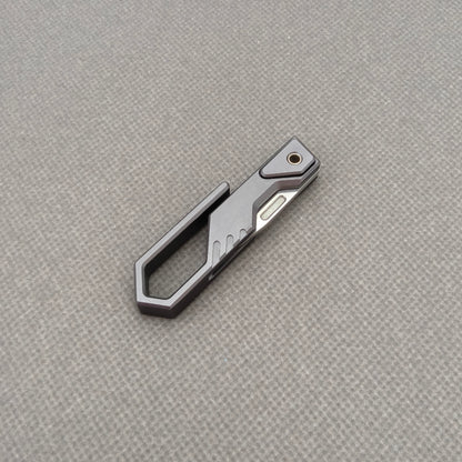 VORIXN NA005 Super Tiny Folding Knife – spine side view showing handle thickness and blade alignment