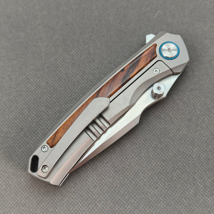 VORIXN KB040 closed clip-side view with pocket clip, screws, and ironwood handle back.