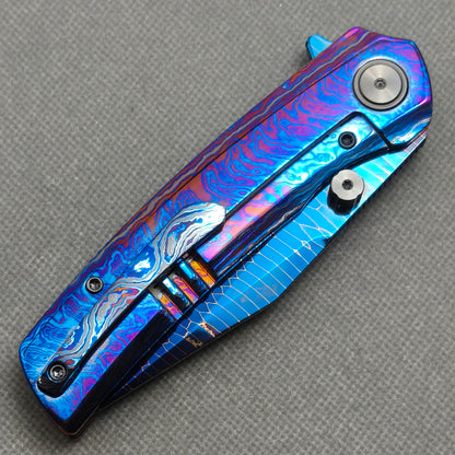 Vorixn "Celestial Current" Flipper & Thumb Stud Knife Hand-Flamed Zirconium Handle (3.8" Damascus Blade) KB099