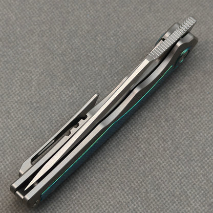 Couteau pliant RIHE Design, manche titane + titane cristallisé (lame Bohler M398 de 3,7") KB076