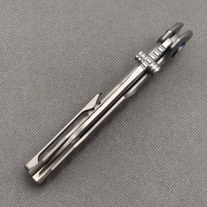 Couteau VORIXN "Longreach" avec ouverture flipper et double-molette, manche en titane (lame 10Cr15CoMoV de 4,1") KB002