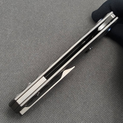 Couteau VORIXN "Longreach" avec ouverture flipper et double-molette, manche en titane (lame 10Cr15CoMoV de 4,1") KB002