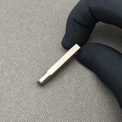 VORIXN NA002 Super Tiny Folding Knife – scale detail showing Titanium texture and finish