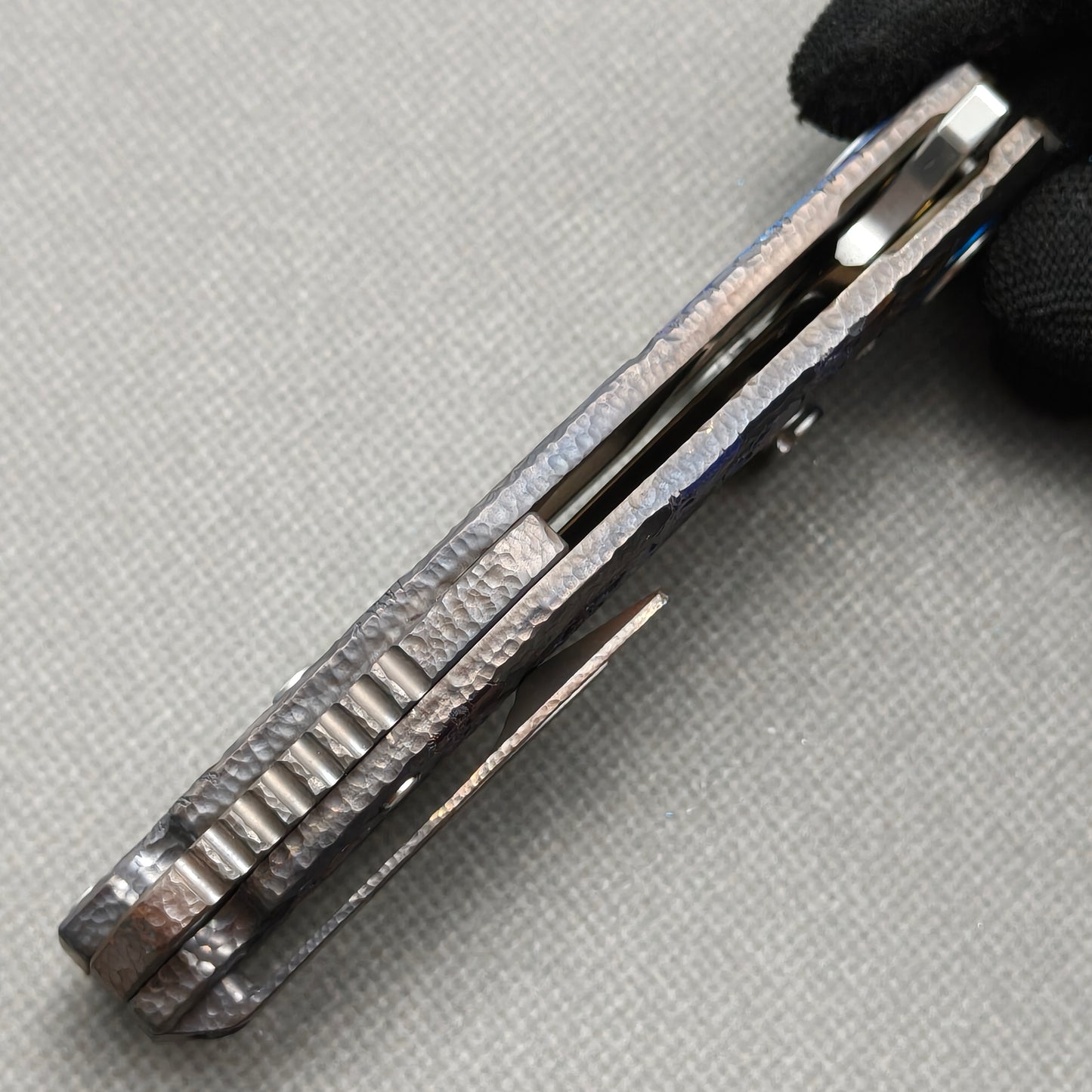 VORIXN KB096 closed side construction view showing pocket clip, spacer, and titanium handle layers.