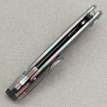 VORIXN PrismWake KB137 Folding Knife – closed side construction view showing pocket clip, spacer, and handle layers.
