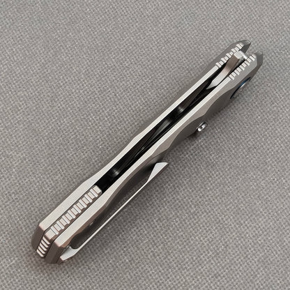 VORIXN KB014 closed side construction view showing pocket clip, spacer, and titanium handle layers.
