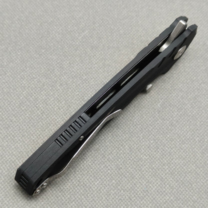 VORIXN KA001 closed side construction view showing pocket clip, spacer, and handle layers.