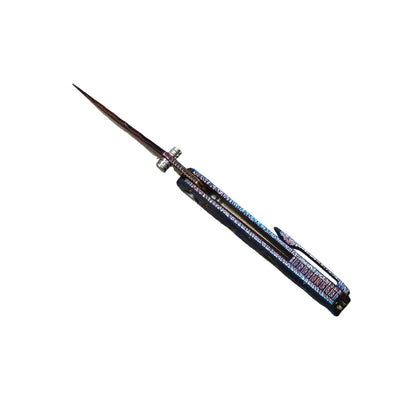 VORIXN Impact Origin titanium Damascus folding knife open, front view from blade spine perspective