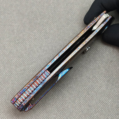 VORIXN KB051 closed side construction view showing pocket clip, spacer, and titanium handle layers.